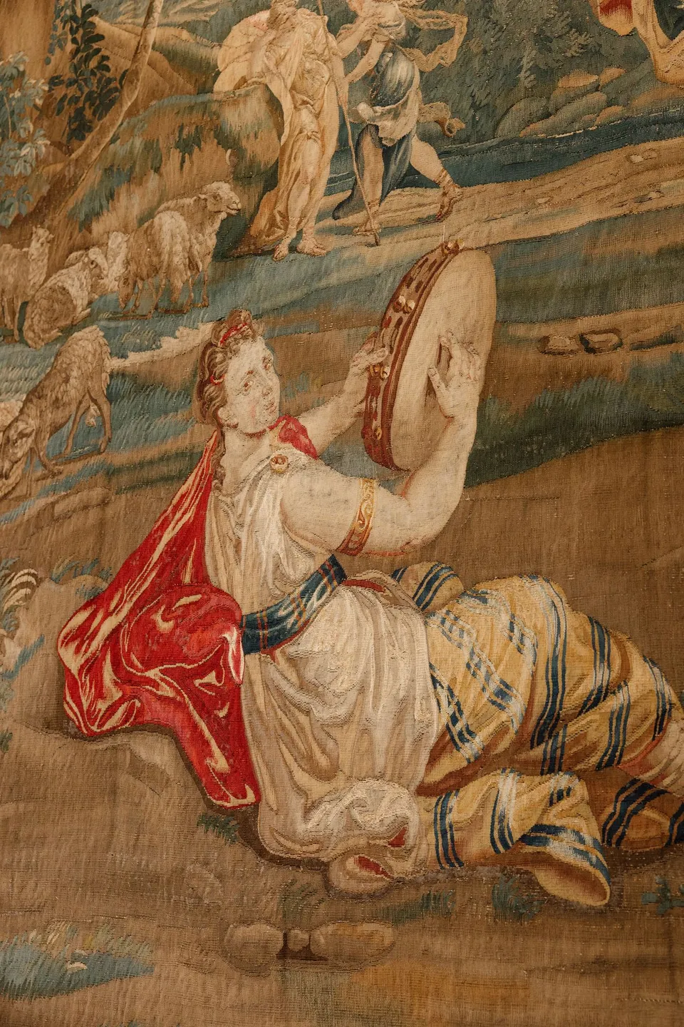 A woven tapestry depicting figures in a wooded landscape inside the villa, at Villa San Michele in Fiesole above Florence, Tuscany, Italy, for an Elopement Collective elopement. Digital photograph by Khara from House of Lucie.